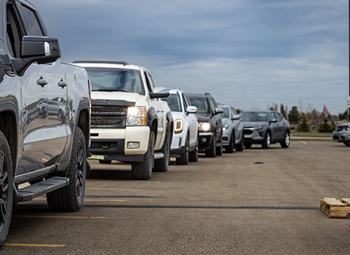 Vehicles lined up during a Roseridge Household Hazardous Waste Round-Up event